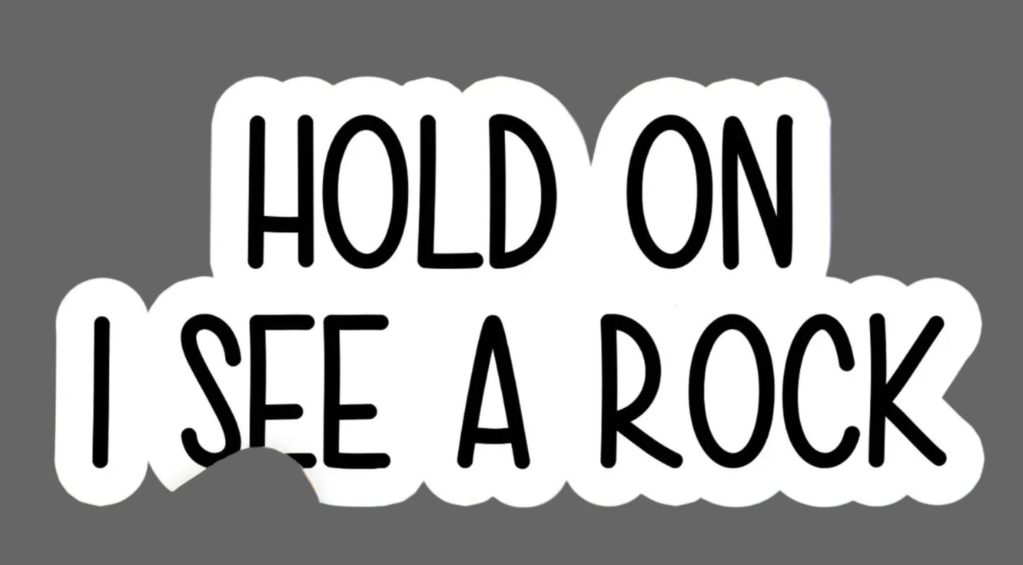 Hold on I see a rock sticker~