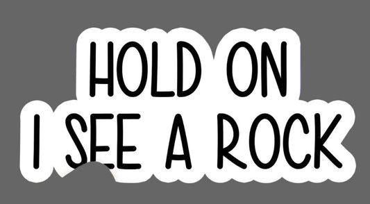 Hold on I see a rock sticker~